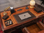 Desk Pad in Dark Coffee Brown on an antique desk with a laptop, brass lamp, globe and leather desk accessories