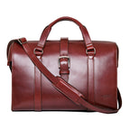 Taylor Duffle Bag in Oxblood, front view with center buckle strap and shoulder strap