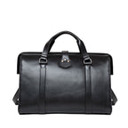 Taylor Duffle Bag in Raven Black, back view with top handles and snap tab