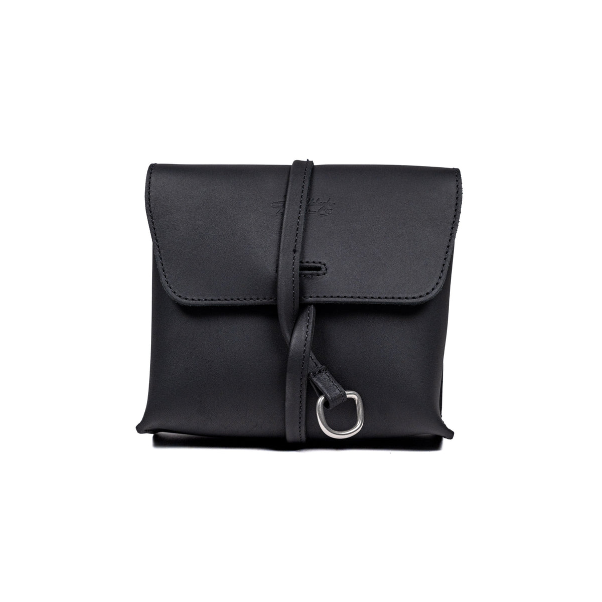 Leather Organizer Bag in Black, straight-on front view with flap closure and strap looped through a metal ring