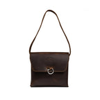 Leather Organizer Bag in Dark Coffee Brown, front view hanging from its strap with flap and metal ring closure