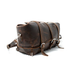 20" Waterbag in Dark Coffee Brown, angled side view with buckle straps and shoulder strap