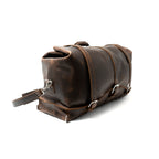 24" Waterbag in dark brown, angled side view showing the end, buckle straps and top handle