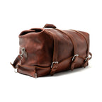 24" Waterbag in reddish brown, angled side view showing the end, buckle straps and top handle