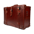 Grandfather Carry On in Chestnut, angled front view with buckle straps and side strap ring