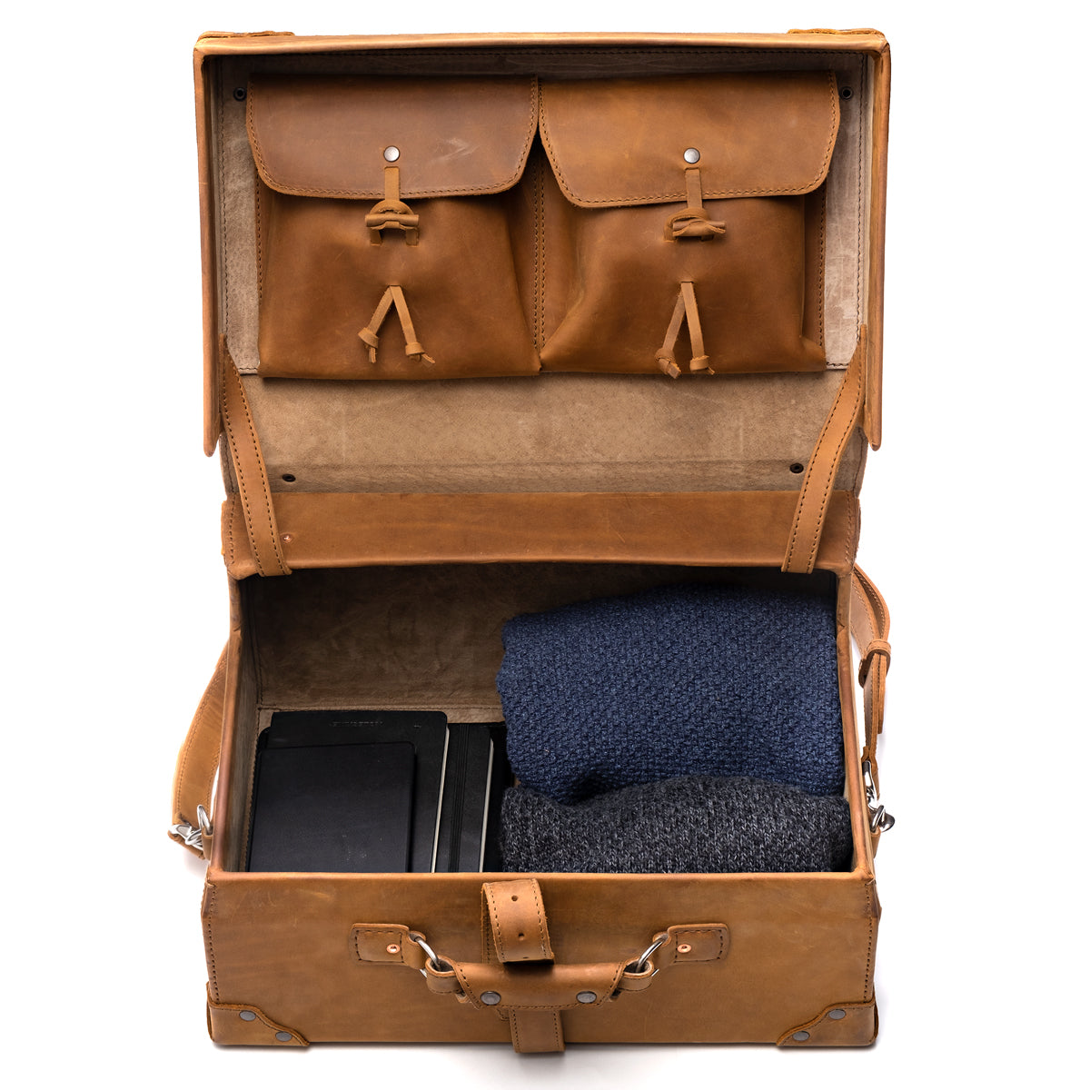 Grandfather Overnight Case in Tobacco, open showing lid pockets and packed folded sweaters