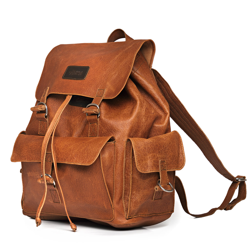 Large Travel Backpack in Bacon, angled front view with flap, front and side pockets