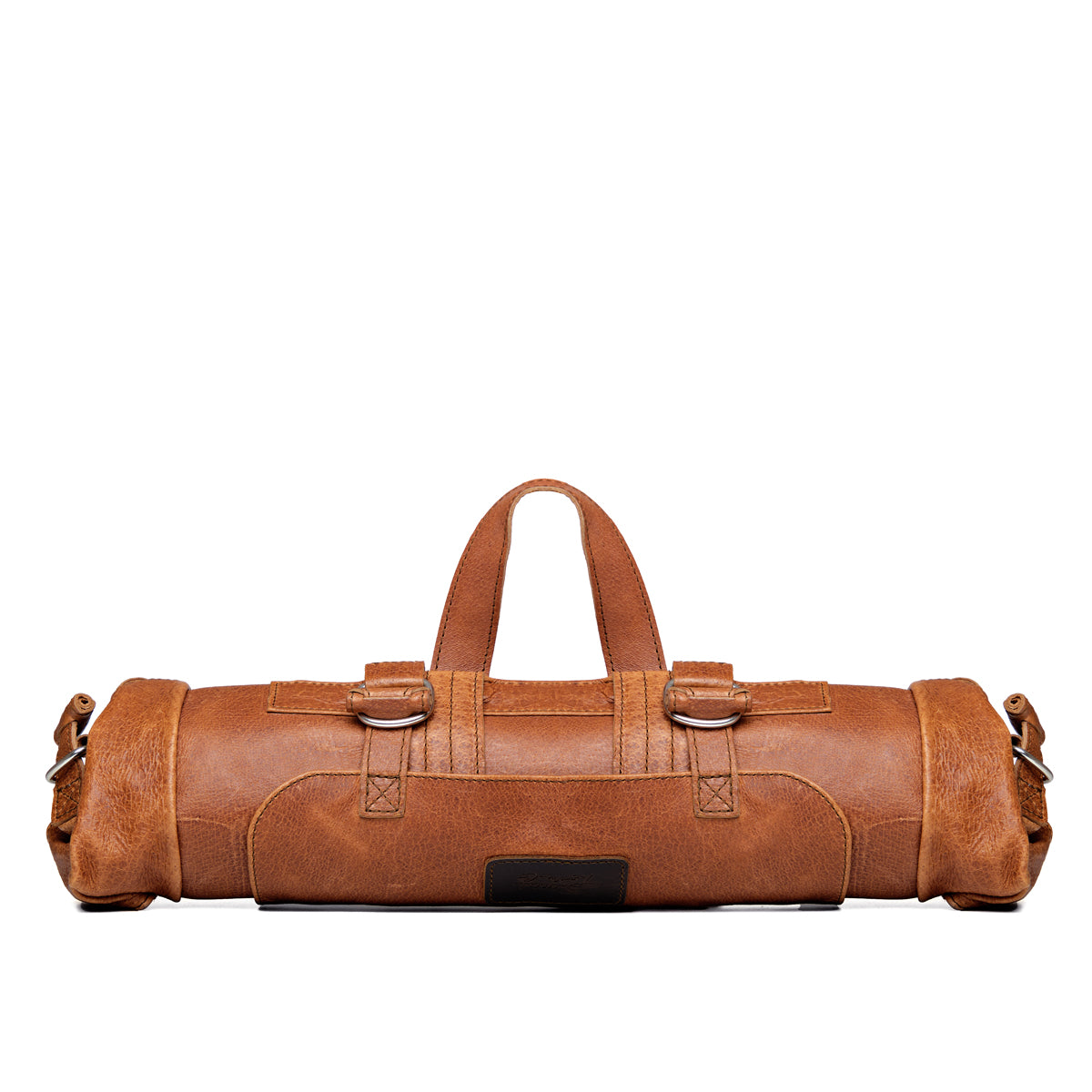Large Travel Backpack in Bacon, rolled up with the top handle raised