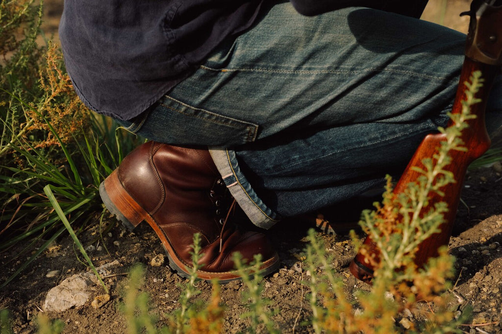 High-quality dark brown boots showing on a model