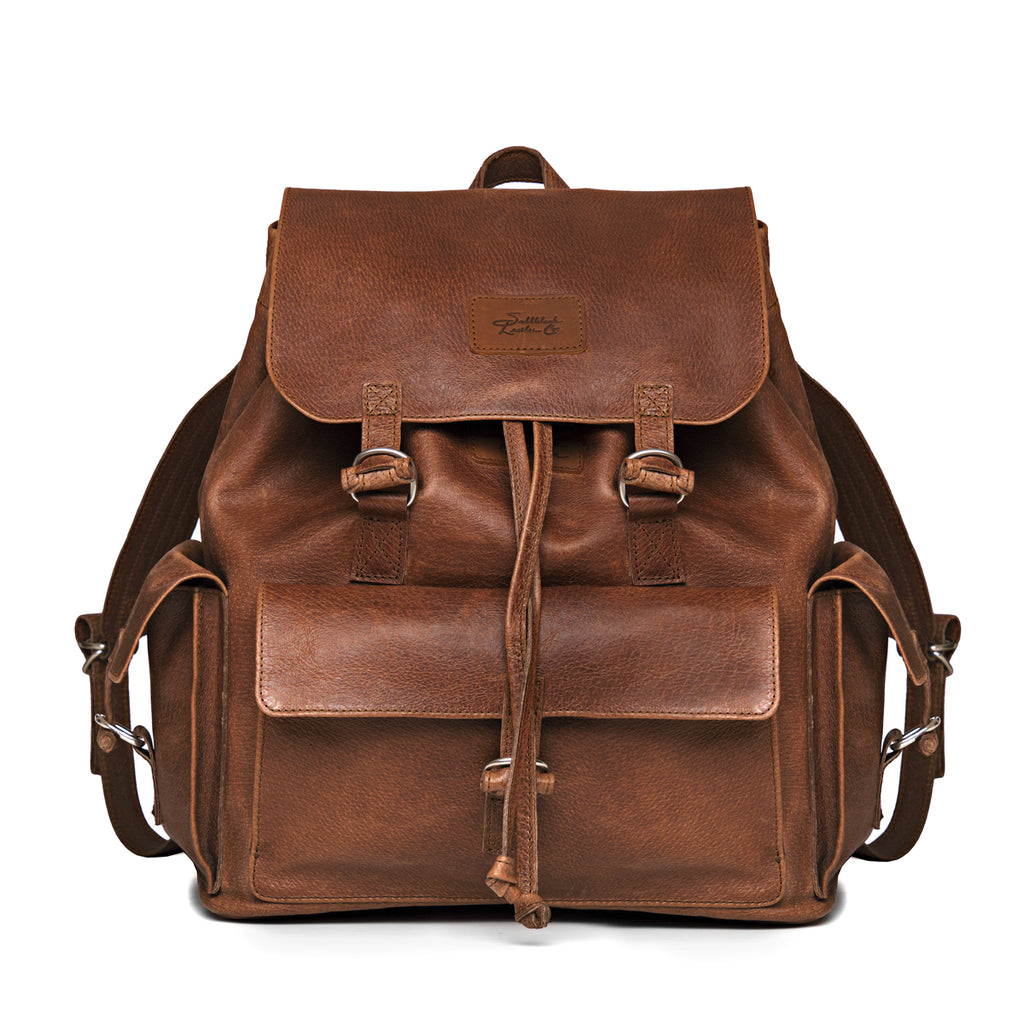 Large Travel Backpack in Burnt Sausage, front view with flap, drawstring, front and side pockets