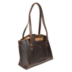 Urban Leather Tote in Dark Coffee Brown, angled front view with shoulder handles, cutout grip and front slip pocket