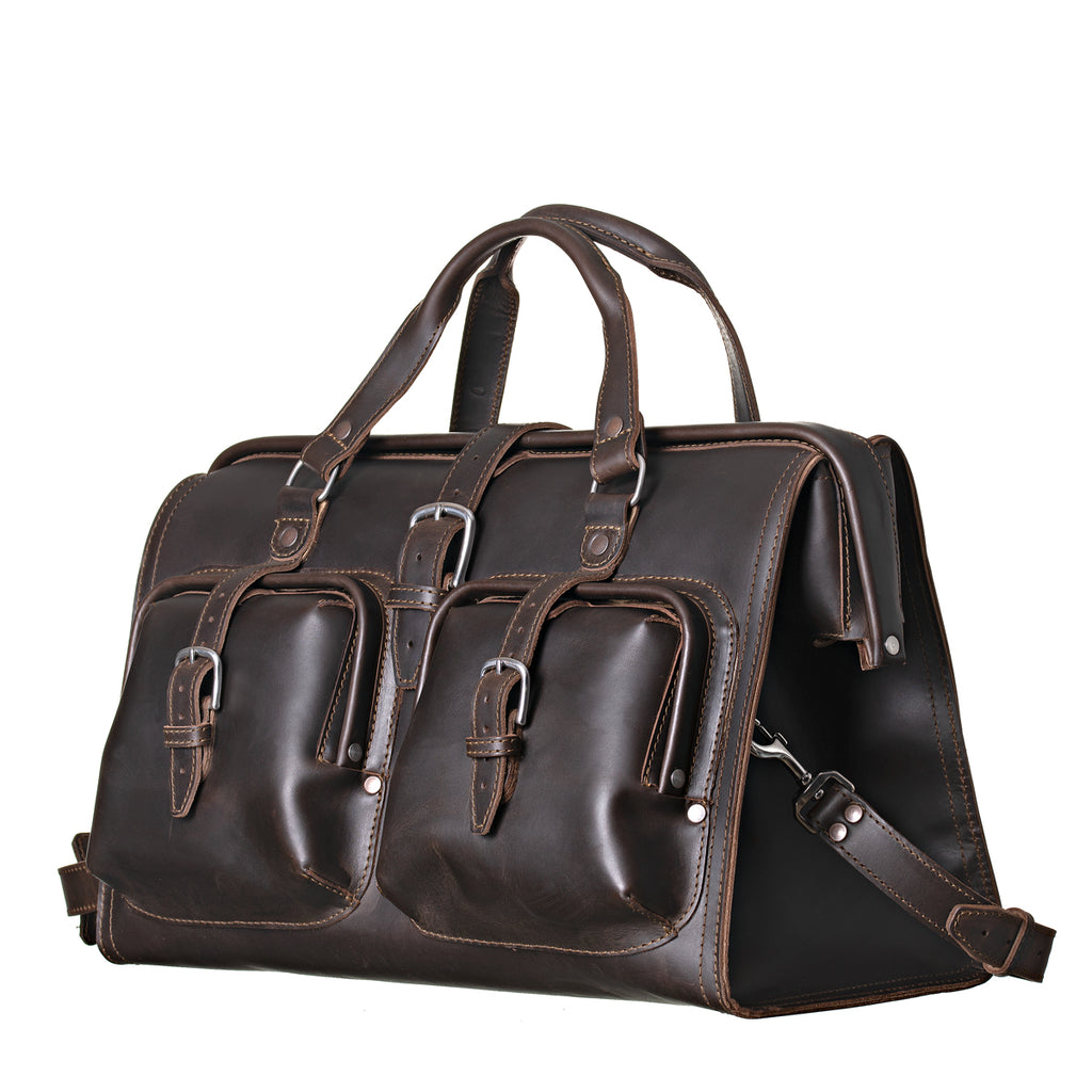 Deep Pocket Leather Duffle Bag in Dark Coffee Brown, angled front view with two buckled front pockets