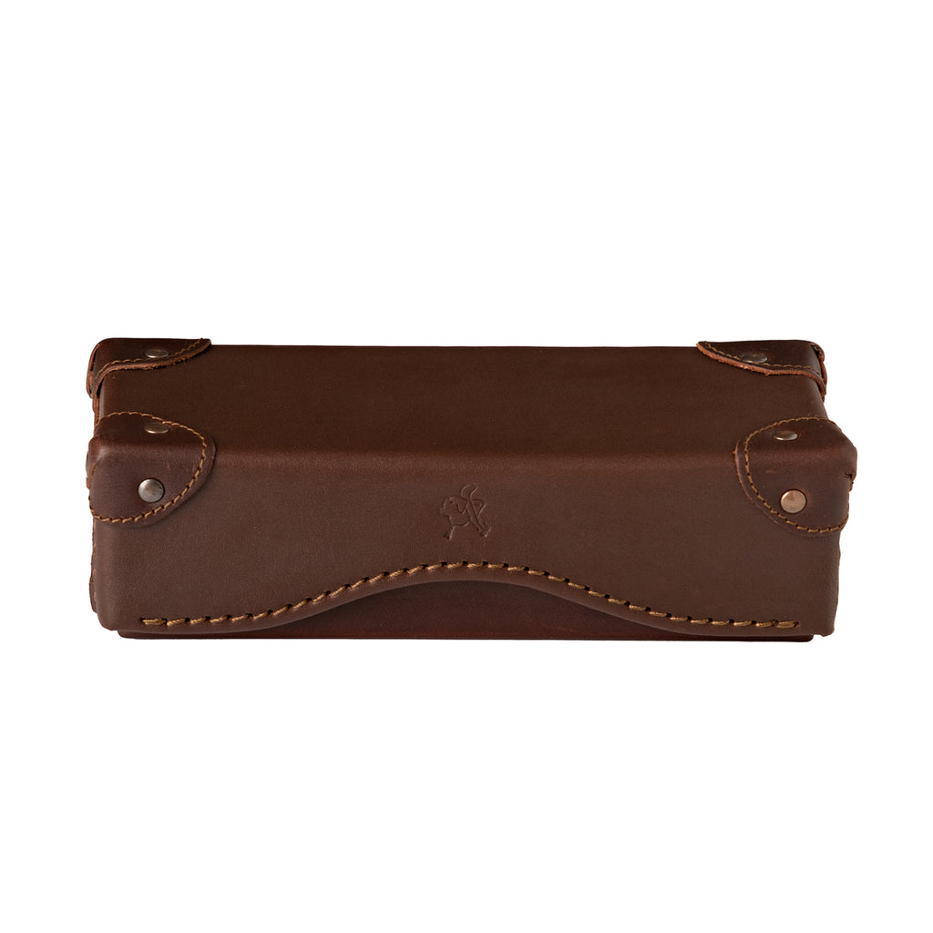 Grandfather Eyeglass Case in Chestnut leather, closed front view with riveted corner caps and embossed tortoise