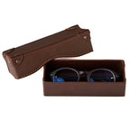 Grandfather Eyeglass Case in Chestnut leather, open with a pair of round eyeglasses inside and lid beside it