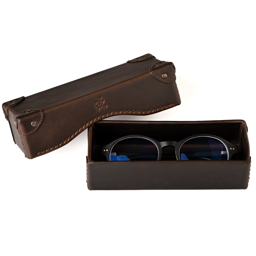 Grandfather Eyeglass Case in Dark Coffee Brown, open with a pair of round eyeglasses inside and lid beside it