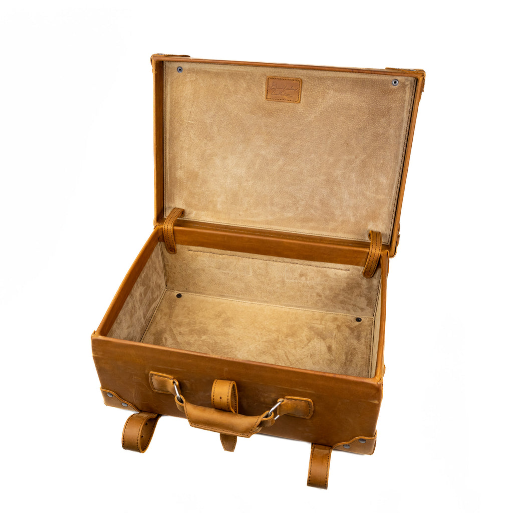 Grandfather Carry On in Tobacco, opened and empty to show the canvas-lined hard-sided interior