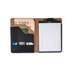 Old Design Medium Leather Portfolio in Black, open with a legal pad, pen, newspaper and cards inside
