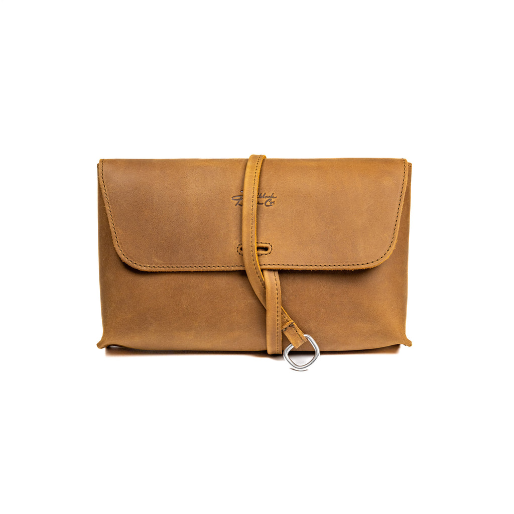 Auto Organizer Set large leather organizer bag in Tobacco, front view closed with strap through the metal ring