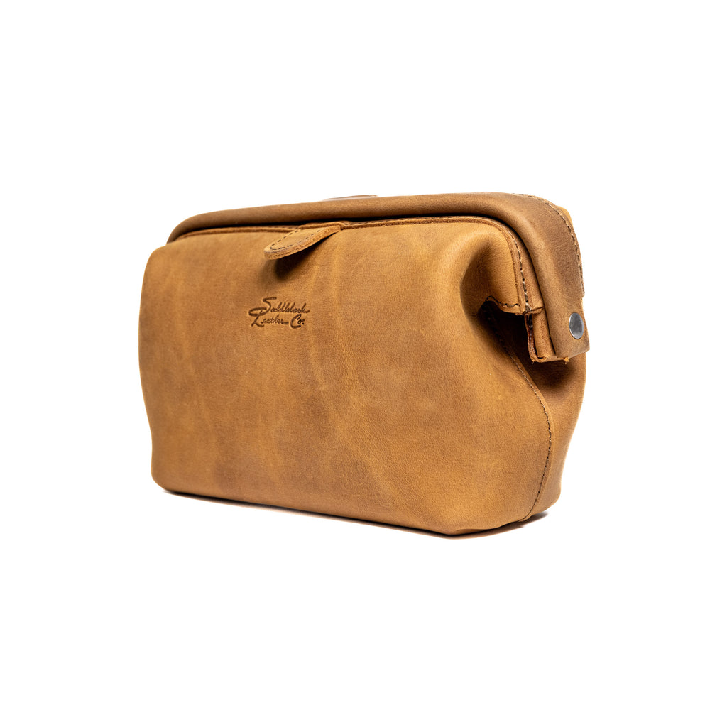 Big Mouth Organizer in Tobacco, angled side view showing the hinged frame and rivet