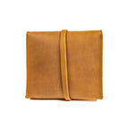 Leather Organizer Bag in Tobacco, back view showing the vertical leather strap