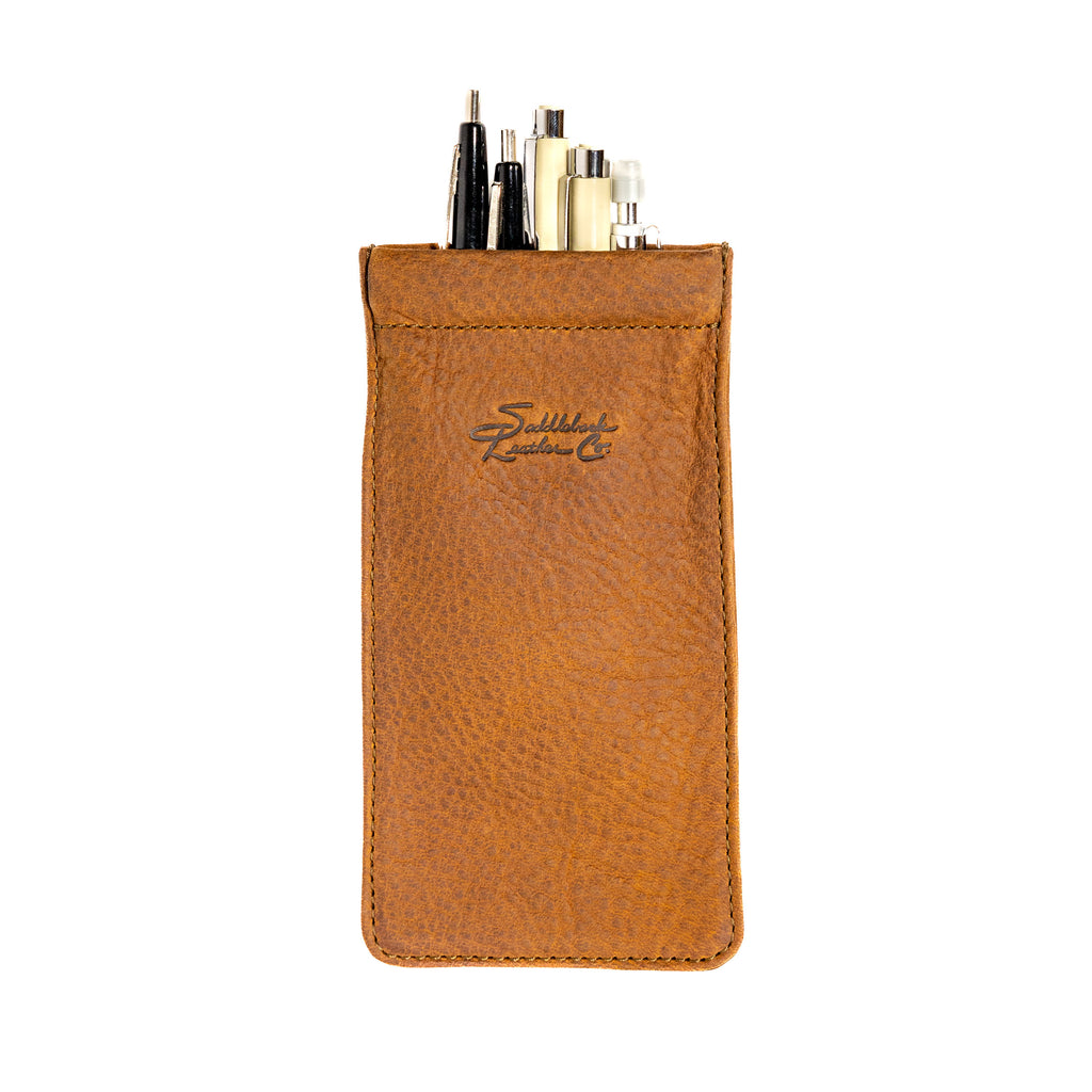 Bear Trap Leather Pen Case in Tobacco holding pens, side with embossed Saddleback Leather Co. script logo