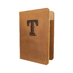 Leather Portfolio - Texas Rangers in Tobacco, angled view of the T logo cover with tan interior edge