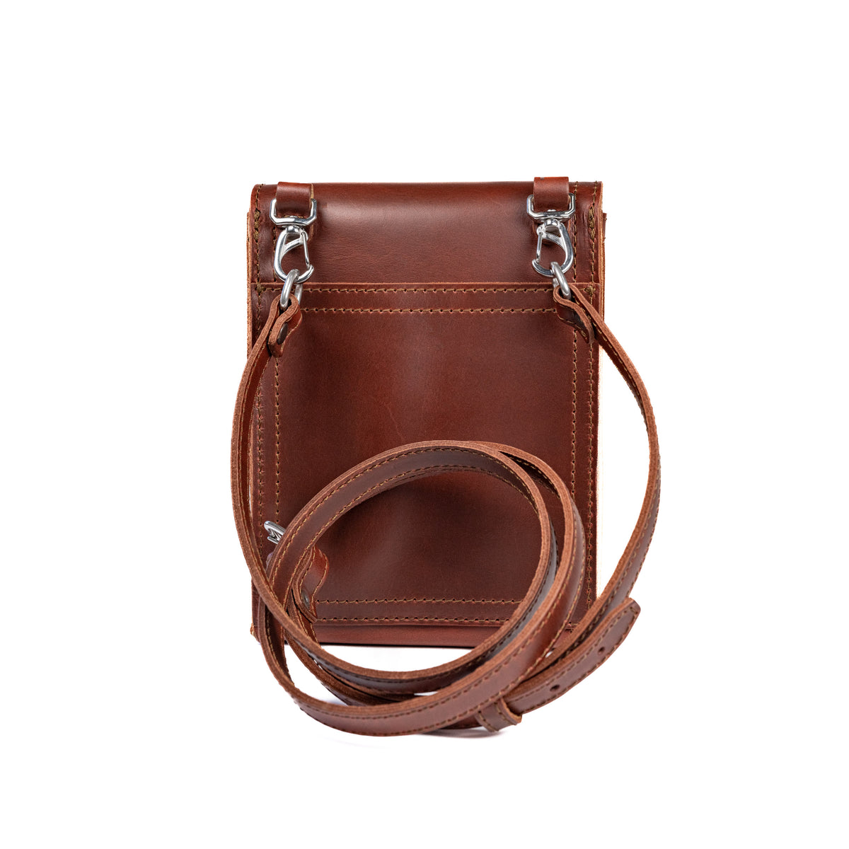 Leather Travel Satchel in Chestnut, back view with removable shoulder strap clipped to swivel hooks