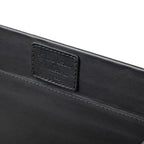 Grandfather Serving Tray in Black leather, close-up of stitched Grandfather Collection patch on the inner wall