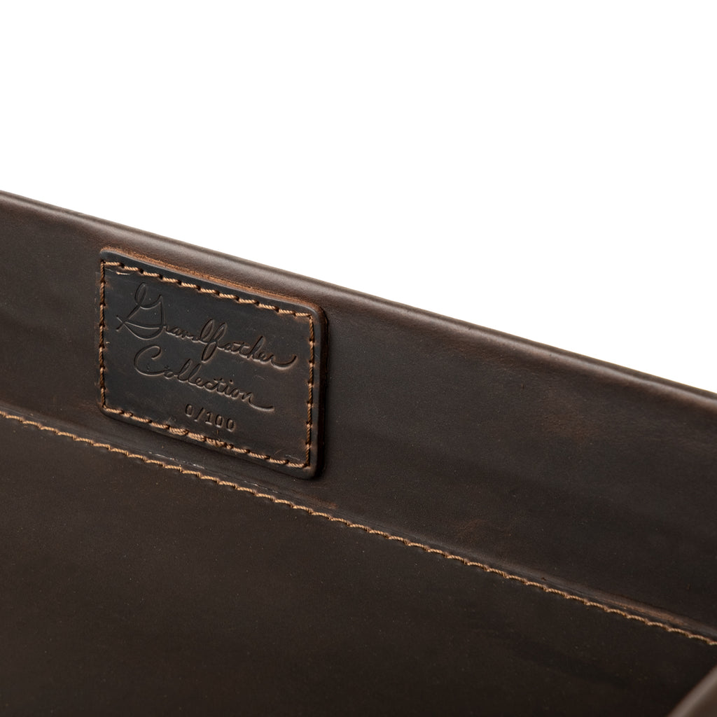 Grandfather Serving Tray in Dark Coffee Brown, close-up of stitched Grandfather Collection patch on the inner wall