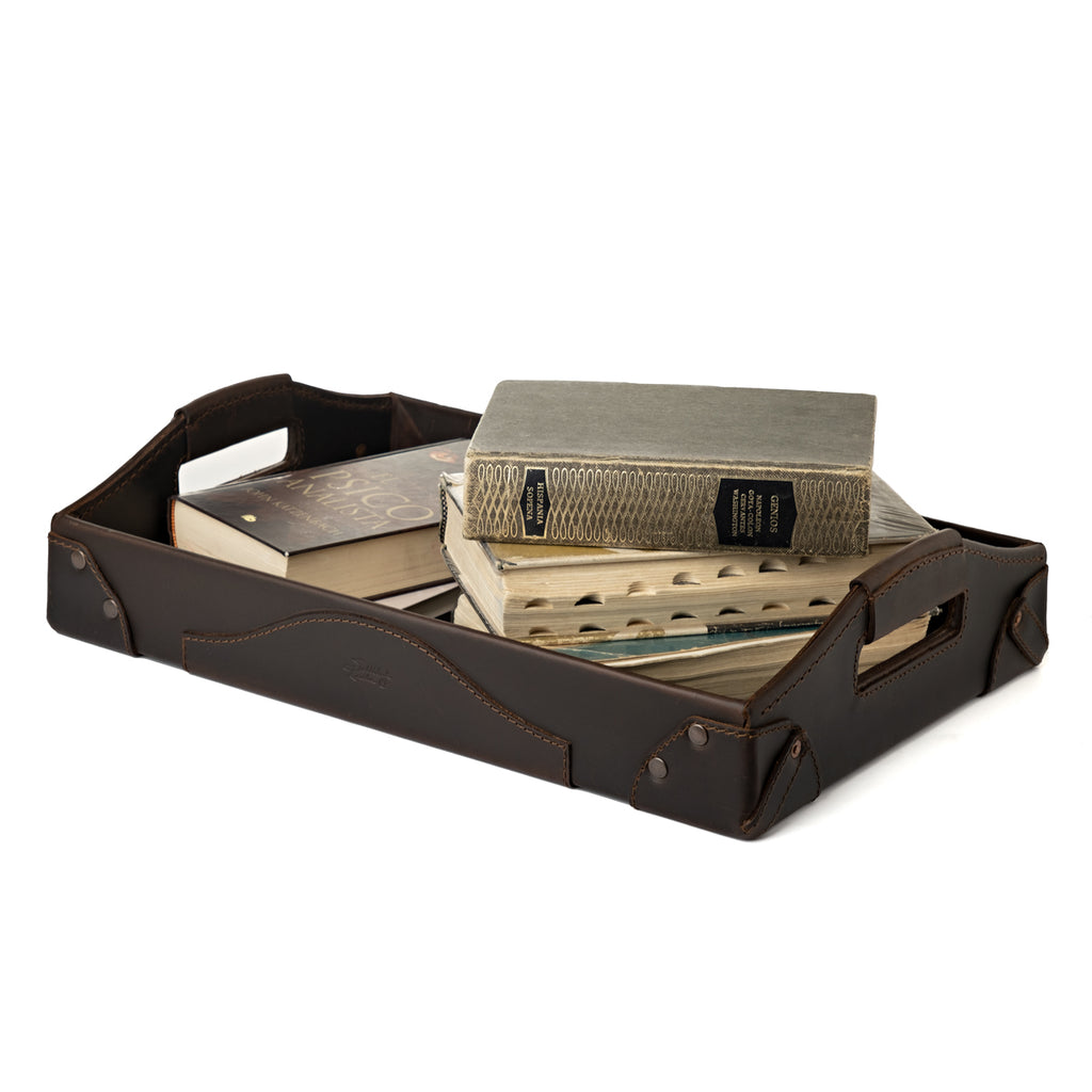 Grandfather Serving Tray in Dark Coffee Brown leather holding a stack of old hardcover books