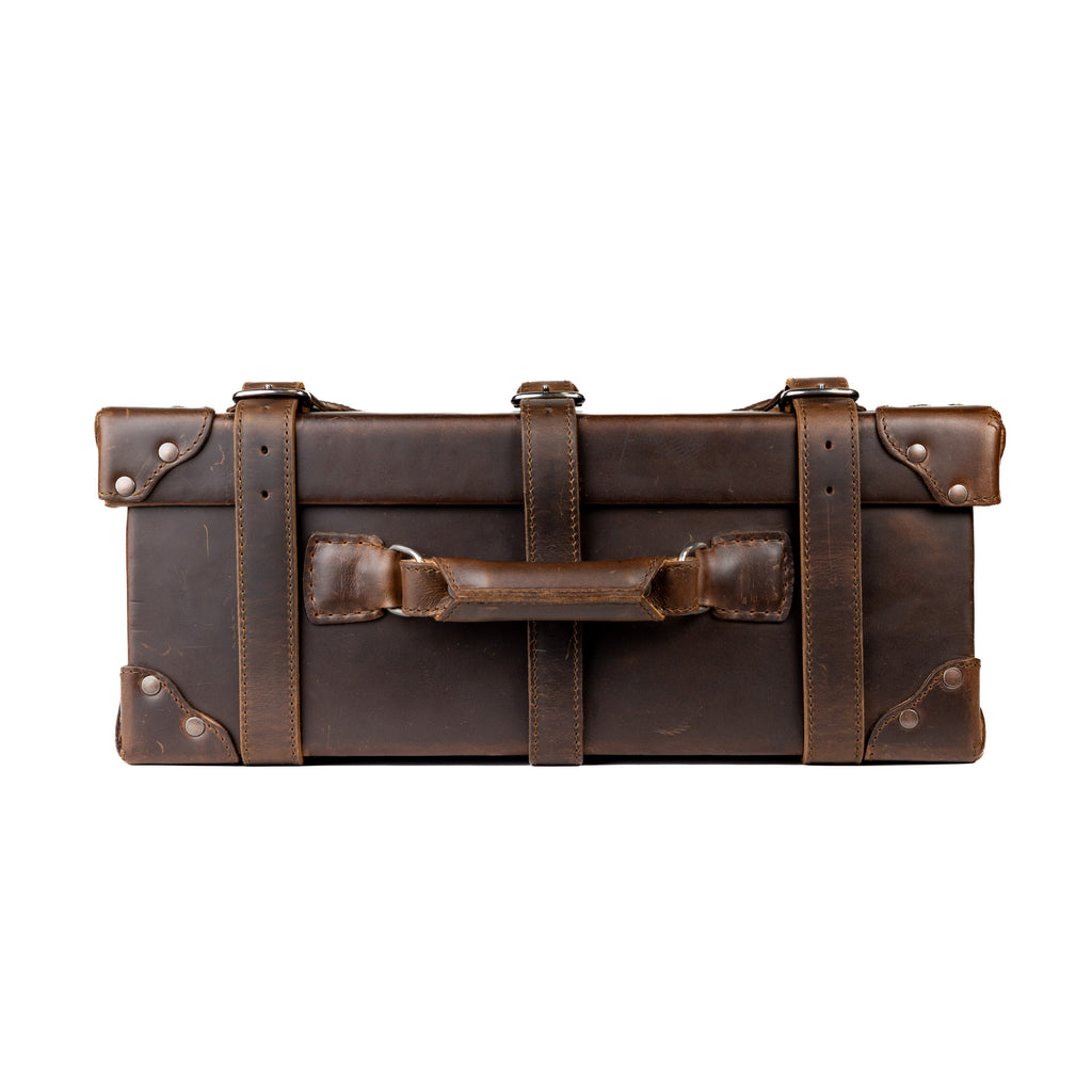 Grandfather Carry On in Dark Coffee Brown, top view showing the leather carry handle and strap keepers
