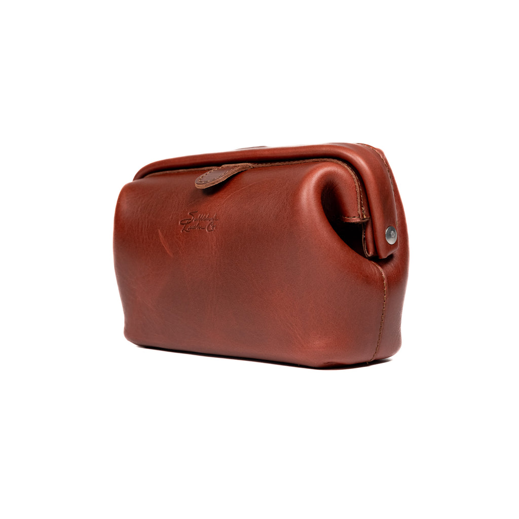 Big Mouth Organizer in Chestnut, angled side view showing the hinged frame and rivet