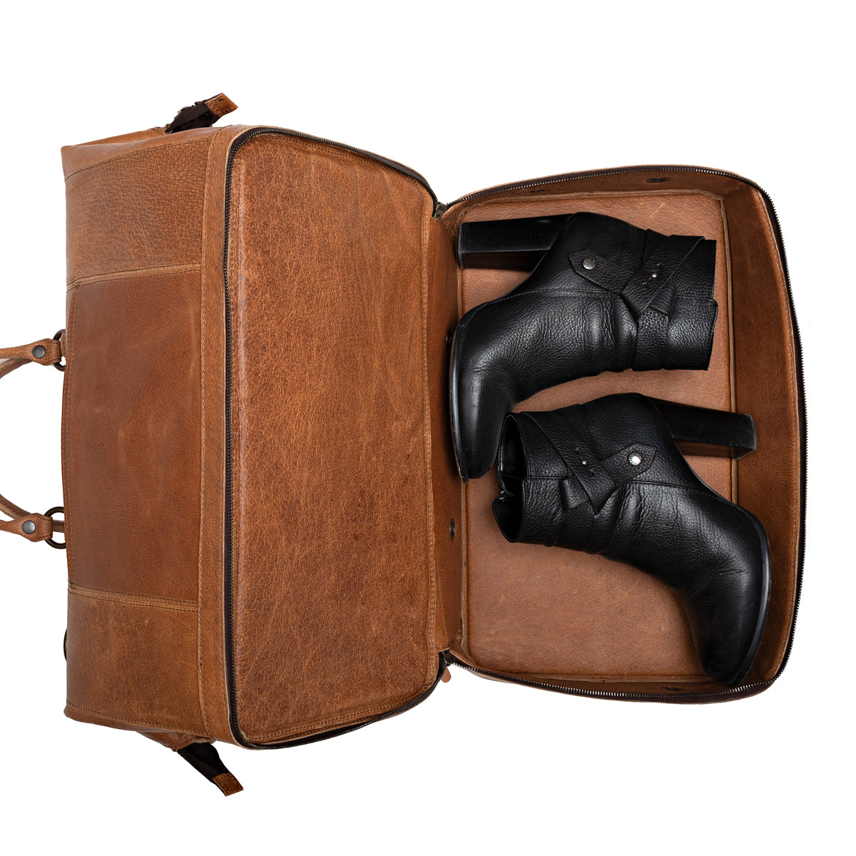 Two Compartment Duffle in Tobacco, bottom shoe compartment opened with a pair of black boots inside