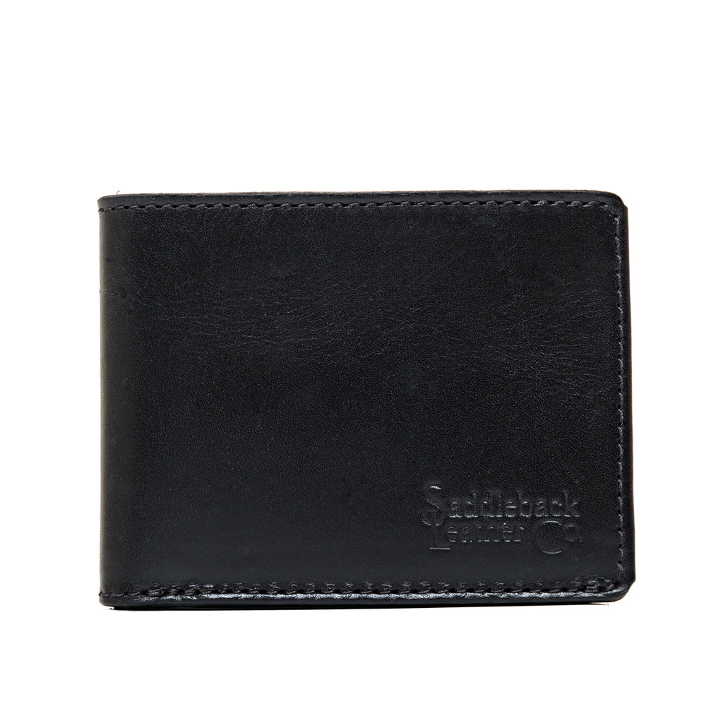 William Penn Bifold Wallet in Raven Black, closed front view with debossed Saddleback Leather Co. logo