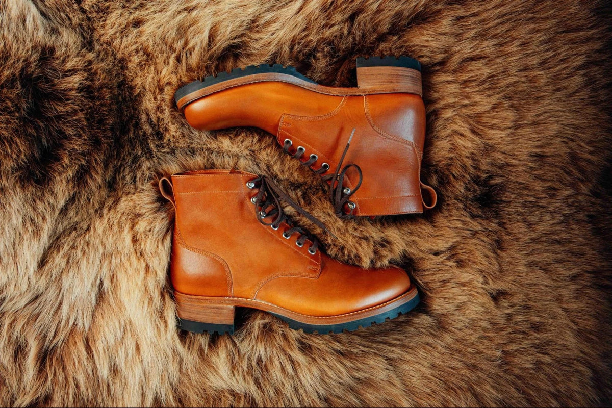 Huntsman Boots - Natural, top view of a pair lying on a brown fur rug