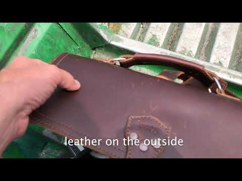 Thin Front Pocket Leather Briefcase. A Laptop Bag description with Pelicans and Storks in Gabon