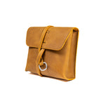 Auto Organizer Set leather organizer bag in Tobacco, angled front view with strap wrapped through the metal ring