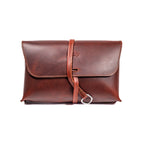 Large Leather Organizer Bag in Chestnut, closed flap with wrapped leather tie and ring, front view