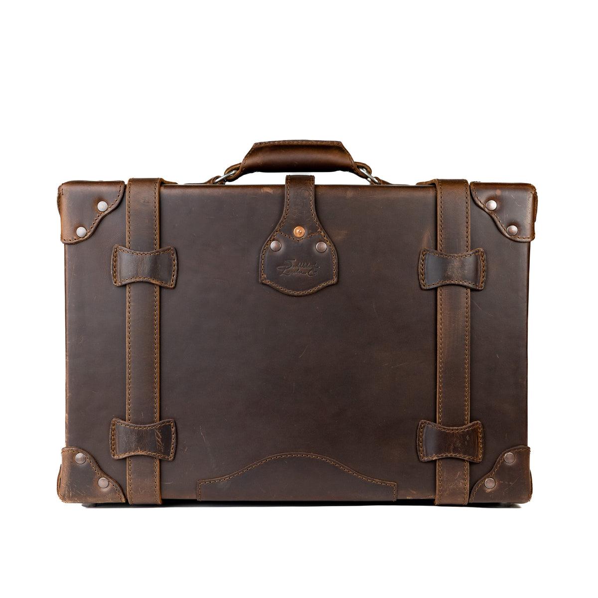 Grandfather Carry On in Dark Coffee Brown, back view with top handle, leather straps and riveted corners