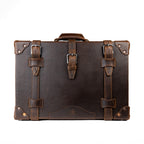 Grandfather Carry On in Dark Coffee Brown, front view with three buckle straps and riveted corner caps