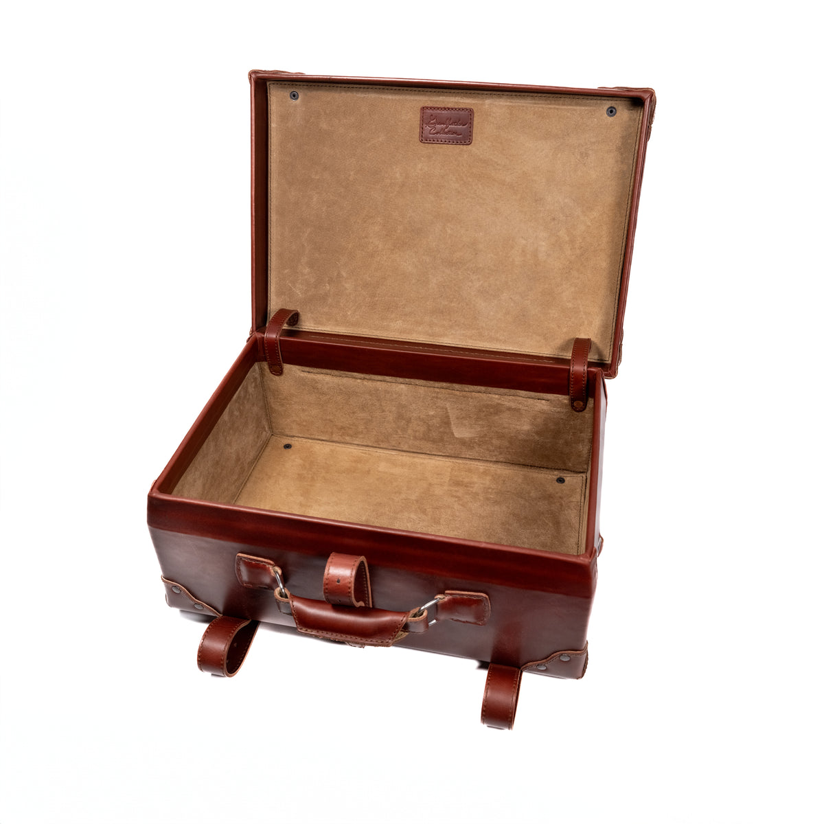 Grandfather Carry On in Chestnut, opened and empty to show the canvas-lined hard-sided interior