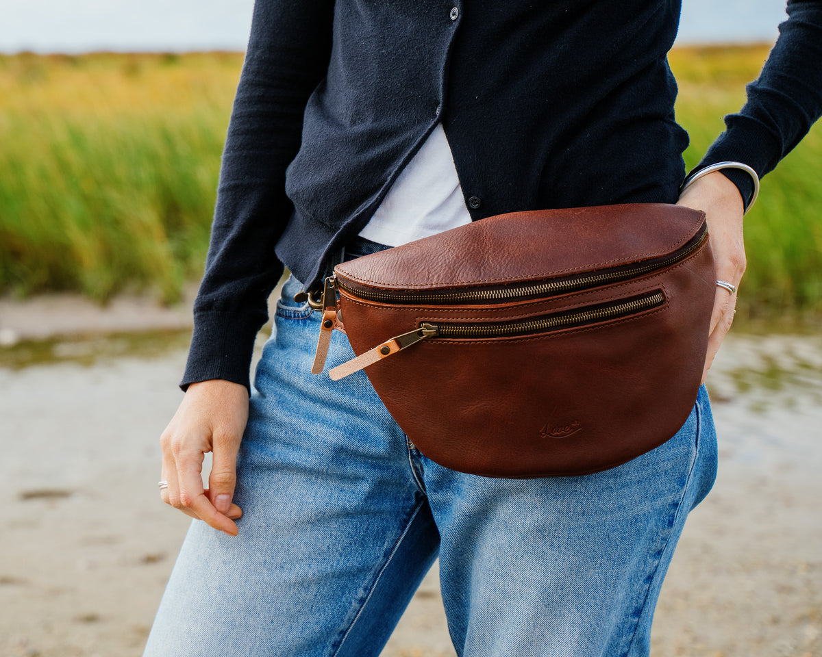 High quality model shot of the dark coffee fanny leather bag
