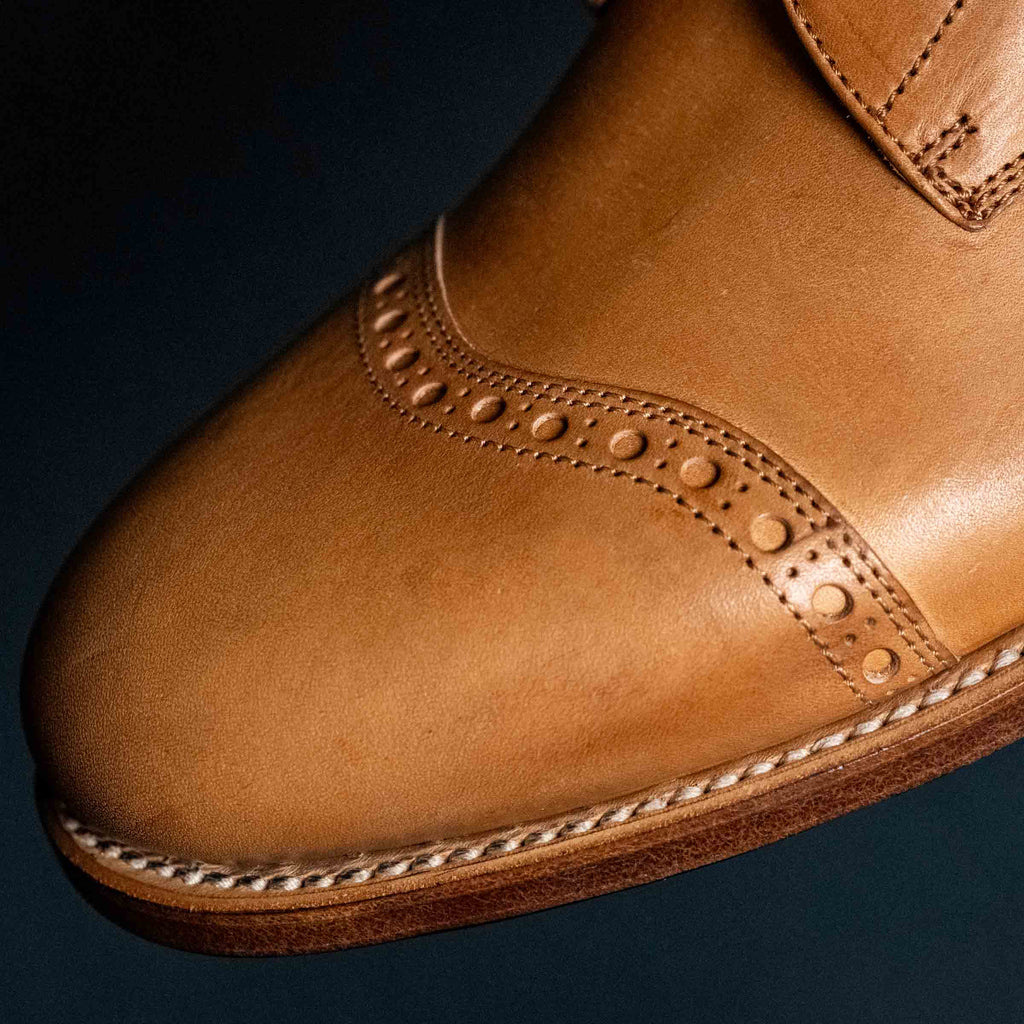 Officer's Boot in English Tan, close-up of the toe cap perforations and welt stitching