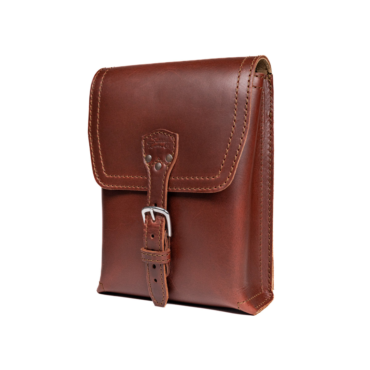 Leather Travel Satchel in Chestnut, angled front view with buckled strap closure on the flap