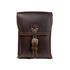 Leather Travel Satchel in Dark Coffee Brown, front view with buckled strap closure on the flap