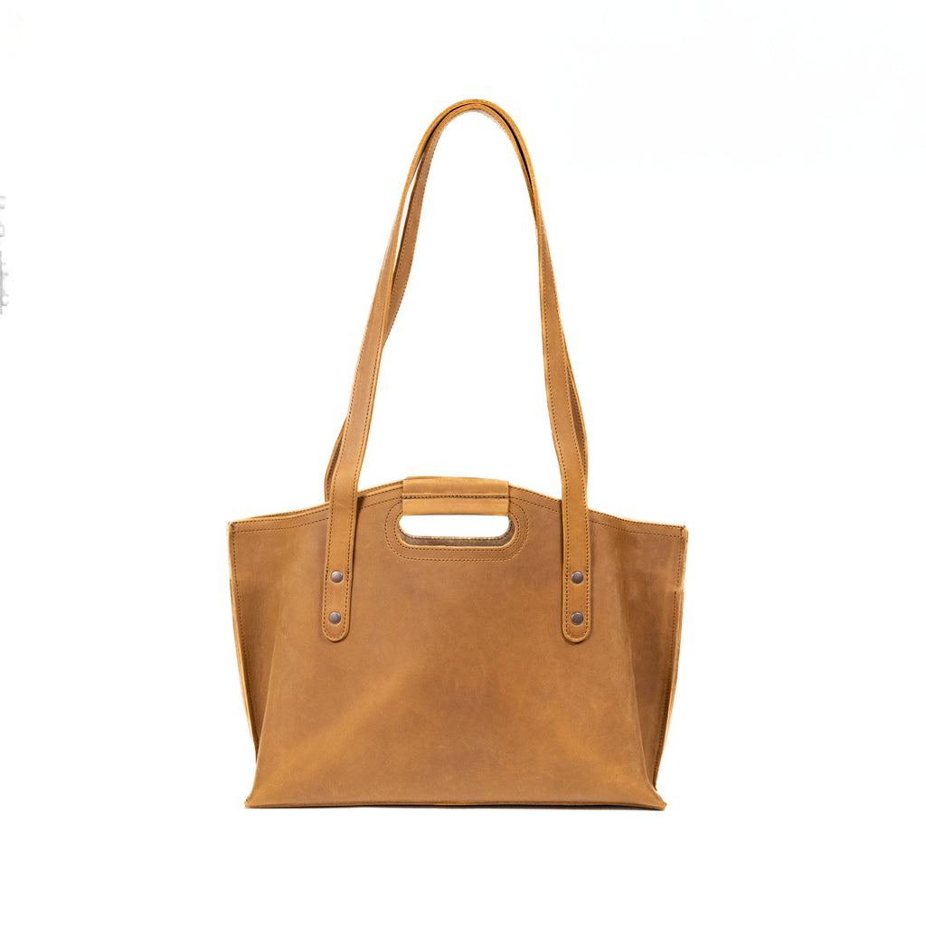 Urban Leather Tote in Tobacco, back view with shoulder handles and cutout grip