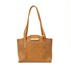 Urban Leather Tote in Tobacco, front view with shoulder handles, cutout grip and embossed front slip pocket