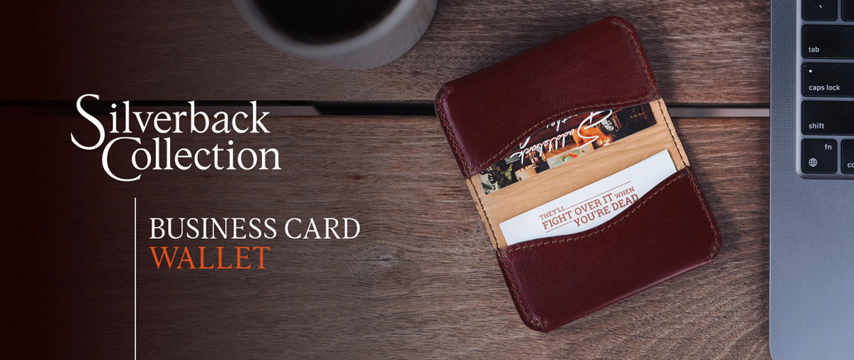 Slim Business Card Holder-Silverback in Oxblood on a wooden desk beside text reading Silverback Collection Business Card Wallet