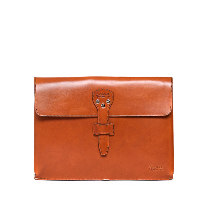 Flat tan leather document holder with a wide front flap and a centre strap-and-stud closure.