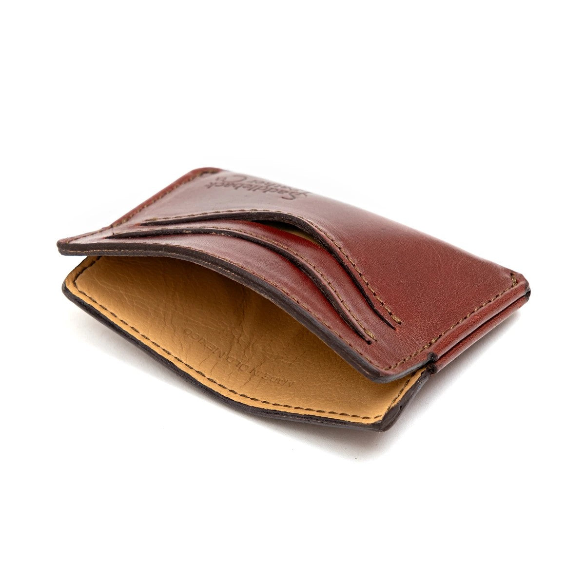 Newton Wallet in Oxblood, angled side view of the card slots showing the tan goatskin lining